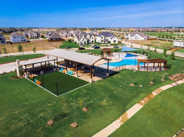 birds eye view of property with a residential view