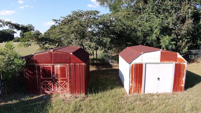 view of outbuilding with a yard