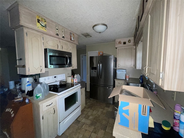 kitchen featuring black refrigerator with ice dispenser, white electric range oven, and a textured ceiling