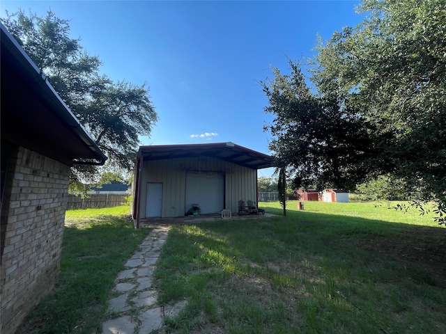 view of yard featuring a storage unit