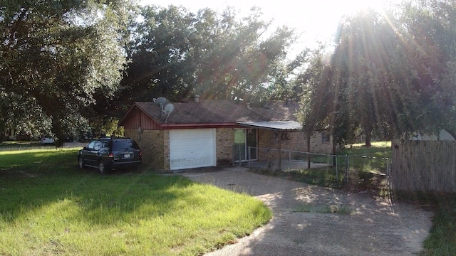 view of property exterior featuring a lawn and a garage