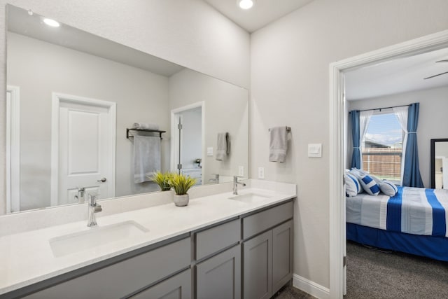 bathroom with hardwood / wood-style floors, a shower with door, and vanity