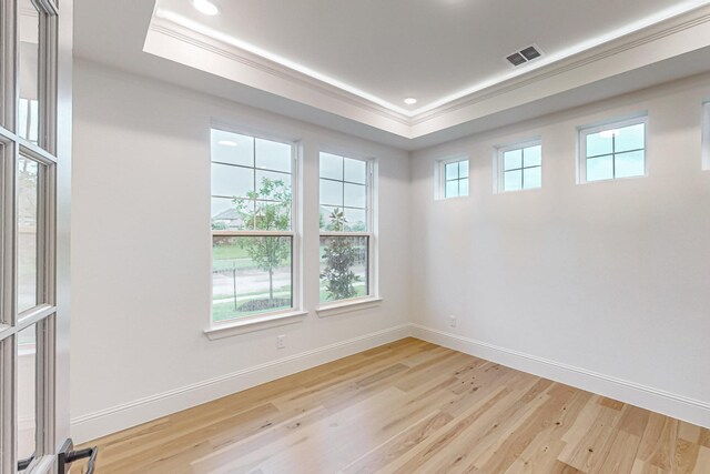 carpeted spare room featuring ceiling fan and beamed ceiling