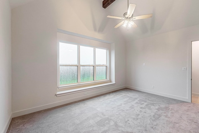 unfurnished room featuring ceiling fan, light carpet, and vaulted ceiling