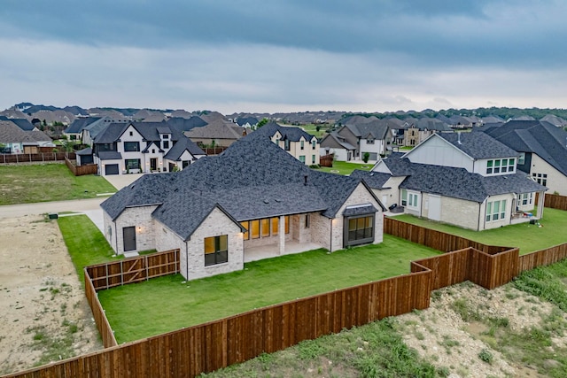 drone / aerial view with a residential view