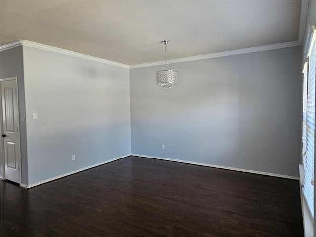 unfurnished room with ornamental molding, an inviting chandelier, and dark wood-type flooring