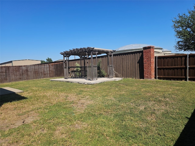 view of yard featuring a pergola and a patio