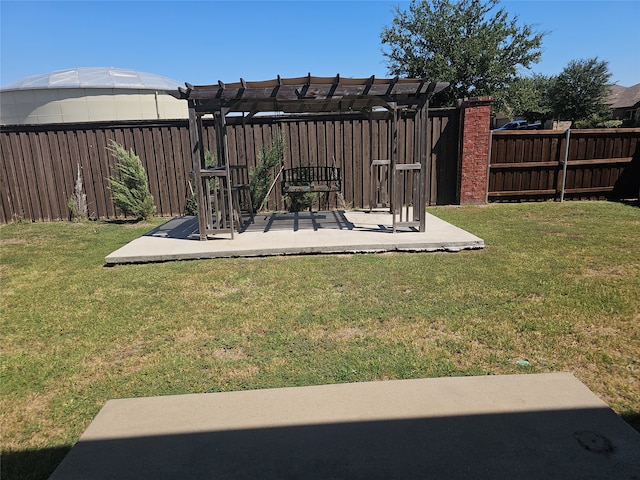 view of yard featuring a pergola and a patio