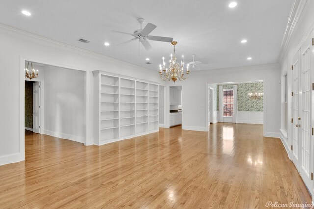 unfurnished living room featuring ceiling fan with notable chandelier, crown molding, and light hardwood / wood-style flooring