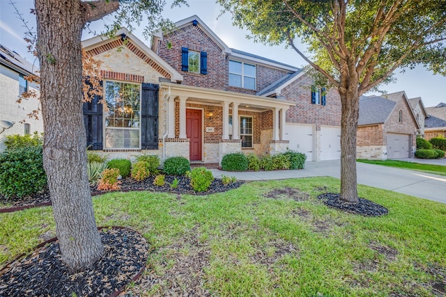 craftsman-style home featuring a garage, a front yard, and covered porch