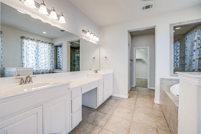 bathroom featuring separate shower and tub, tile patterned floors, and vanity