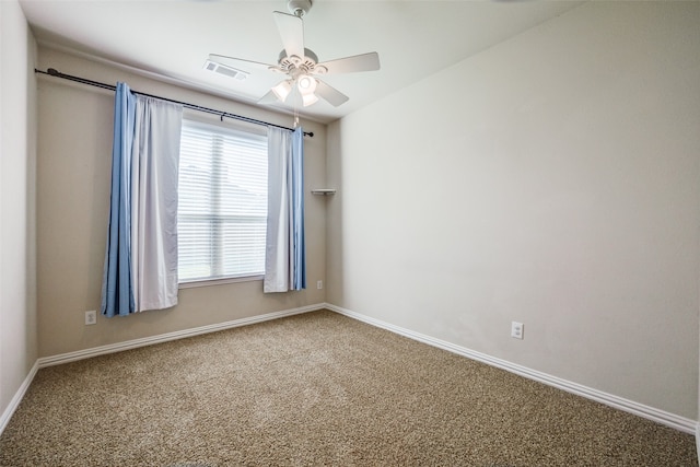 carpeted empty room with ceiling fan