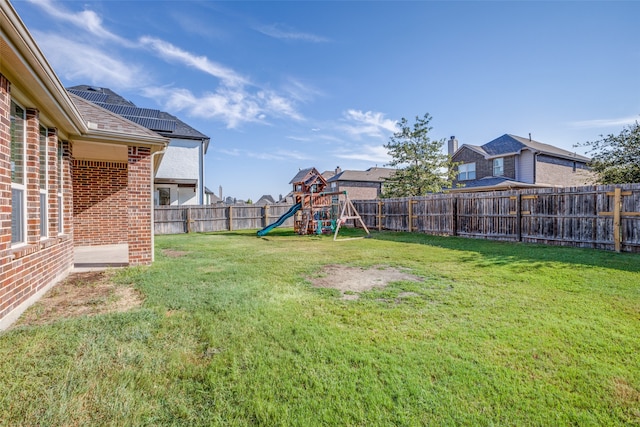 view of yard with a playground