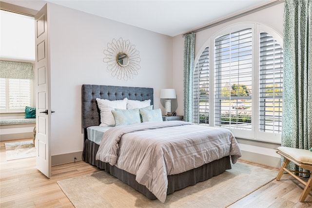 bedroom featuring light wood-type flooring