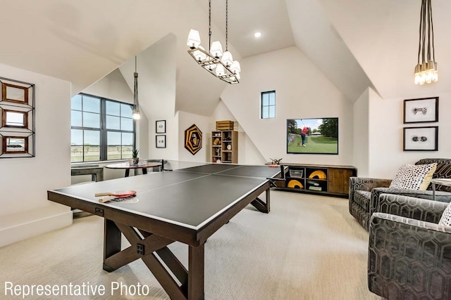 playroom with lofted ceiling and light carpet