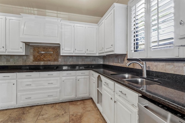 kitchen with dishwasher, white cabinetry, backsplash, and light tile patterned floors