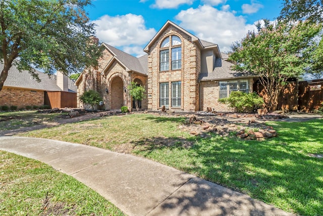 view of front of home with a front yard