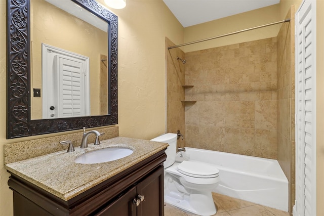 full bathroom with tiled shower / bath combo, vanity, toilet, and tile patterned flooring