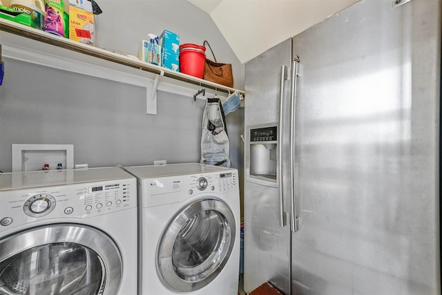 clothes washing area featuring independent washer and dryer