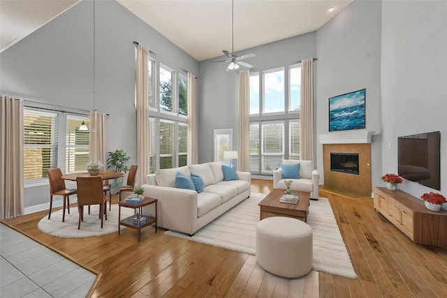 bedroom with carpet flooring, ceiling fan, baseboards, lofted ceiling, and visible vents