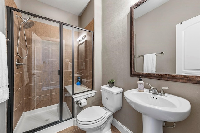 bathroom with walk in shower and toilet