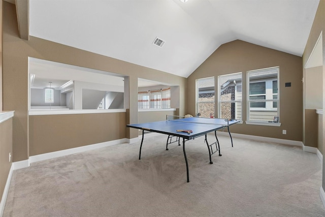 bedroom featuring carpet flooring, baseboards, visible vents, and lofted ceiling