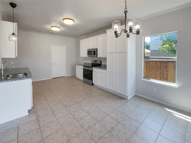 kitchen featuring pendant lighting, light tile patterned floors, appliances with stainless steel finishes, sink, and white cabinets