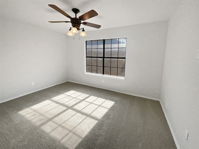 empty room with carpet flooring and ceiling fan