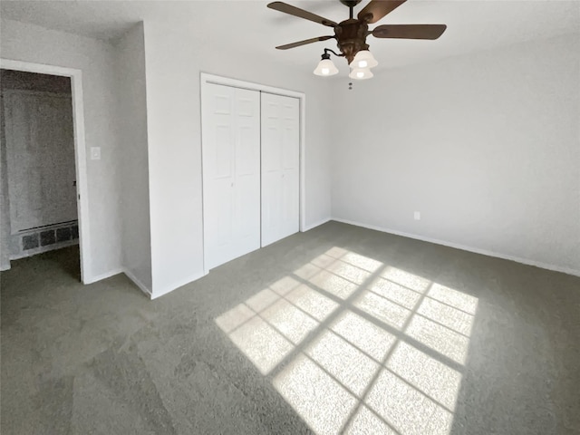 unfurnished bedroom with a closet, carpet, and a ceiling fan