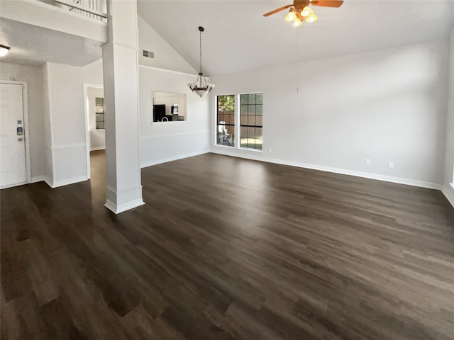 unfurnished living room with high vaulted ceiling, ceiling fan with notable chandelier, and dark hardwood / wood-style floors