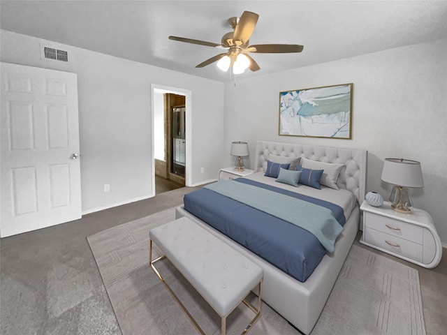 bedroom with baseboards, visible vents, a ceiling fan, and ensuite bathroom