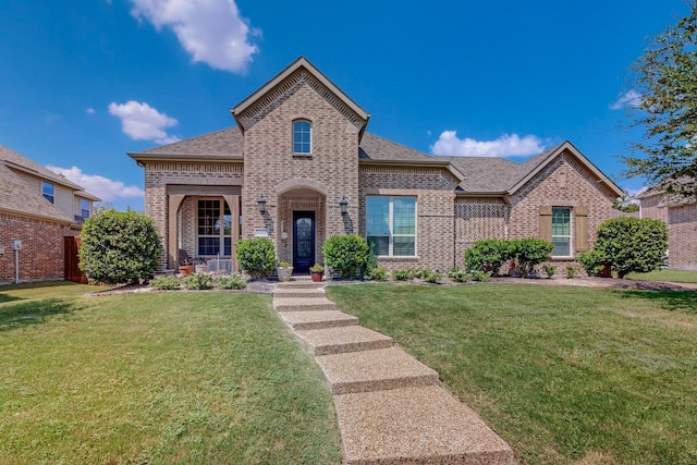 view of front of home with a front lawn