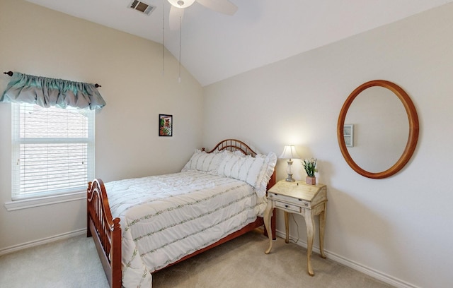 carpeted bedroom featuring vaulted ceiling and ceiling fan