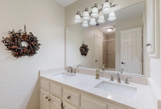 bathroom with vanity and tiled shower / bath combo