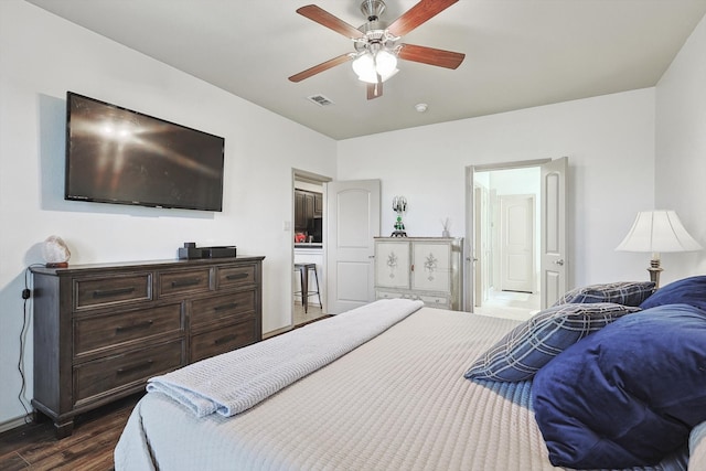 bedroom with dark wood-type flooring and ceiling fan