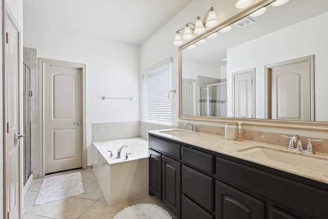 bathroom with vanity, shower with separate bathtub, and tile patterned flooring