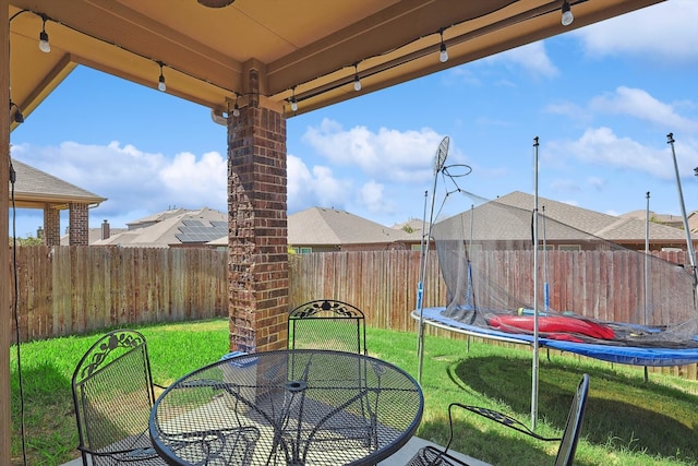 view of patio with a trampoline