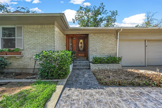 entrance to property with a garage