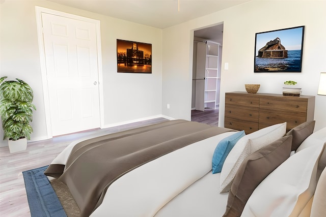 bedroom featuring light wood-type flooring