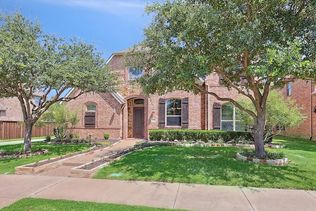 view of front of property with a front lawn