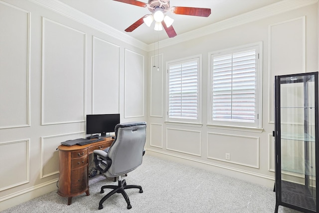 office featuring light carpet, crown molding, and ceiling fan