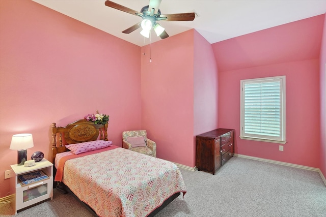 carpeted bedroom featuring lofted ceiling and ceiling fan