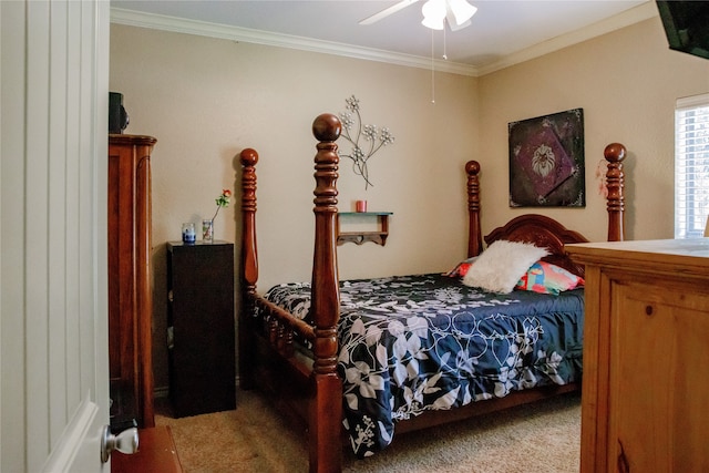 bedroom with carpet flooring, ceiling fan, and crown molding