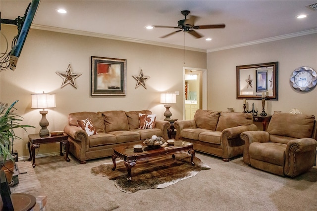 carpeted living room with crown molding and ceiling fan