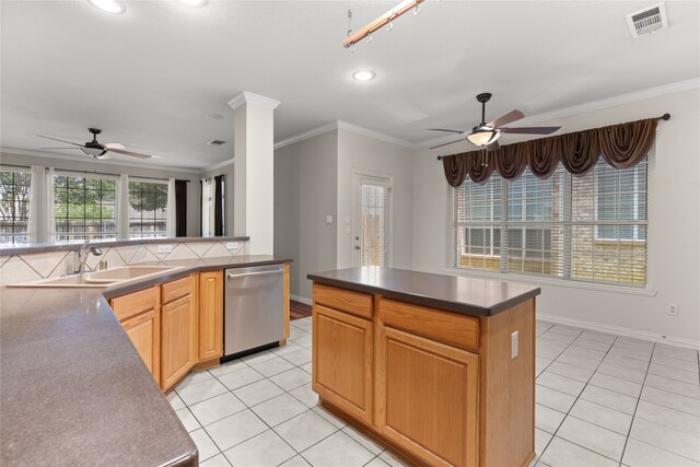 kitchen featuring dishwasher, ceiling fan, light tile patterned floors, and backsplash