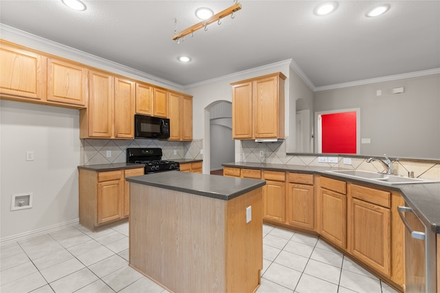 kitchen featuring light tile patterned floors, a center island, sink, black appliances, and decorative backsplash