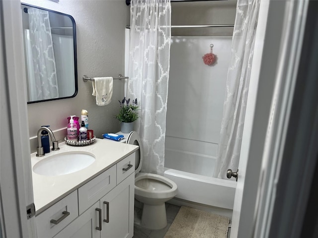 full bathroom featuring vanity, toilet, tile patterned floors, and shower / bath combo with shower curtain