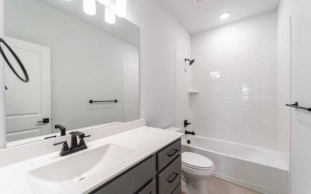 full bathroom featuring vanity, tile patterned flooring, shower / bathing tub combination, and toilet