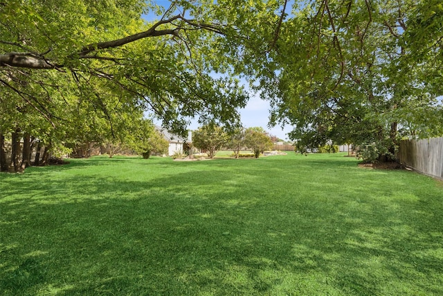 view of yard with fence