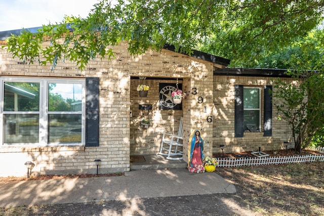 view of front of home with a patio area